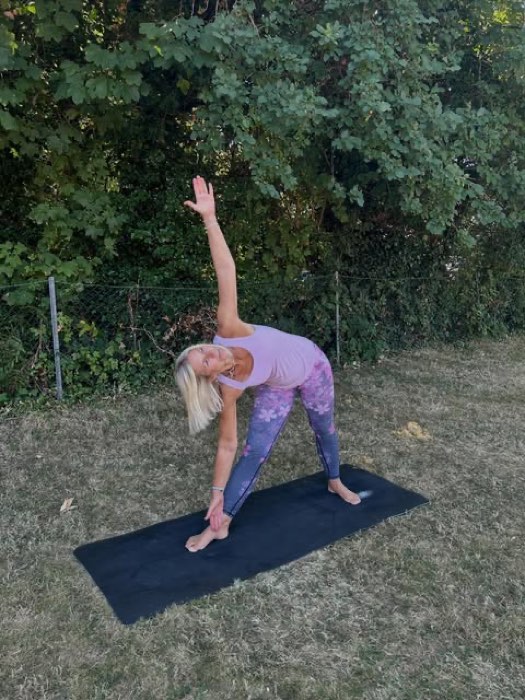 Steph in triangle pose